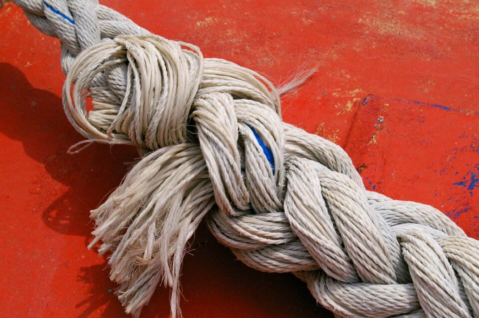 Fixing woven cordage