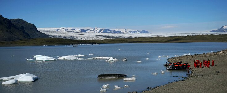 Glacial lake boats landscape photo