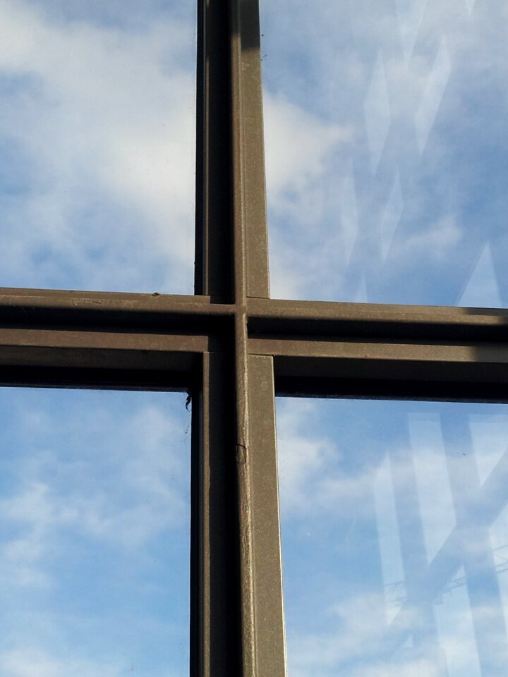Old window glass sky