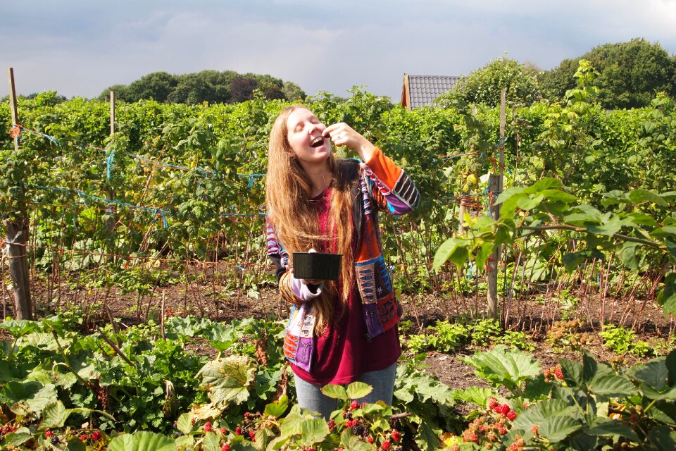Young woman long hair gardening