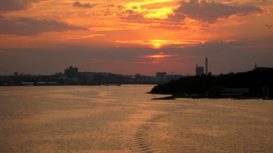 Orange sky urban landscape water