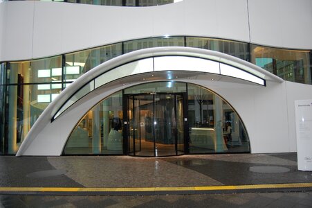 Glass door modern building entrance photo