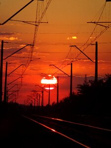 Landscape railroad tracks red sky