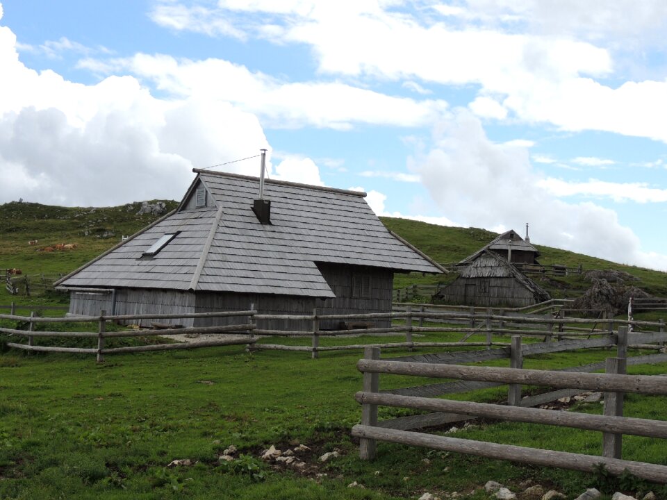 Wooden houses mountain home fields