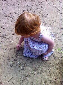 Blonde sand little girl photo
