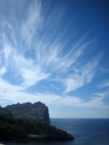 Clouds sun and sea mediterranean photo
