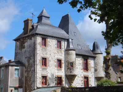 Stone house red windows medieval style photo