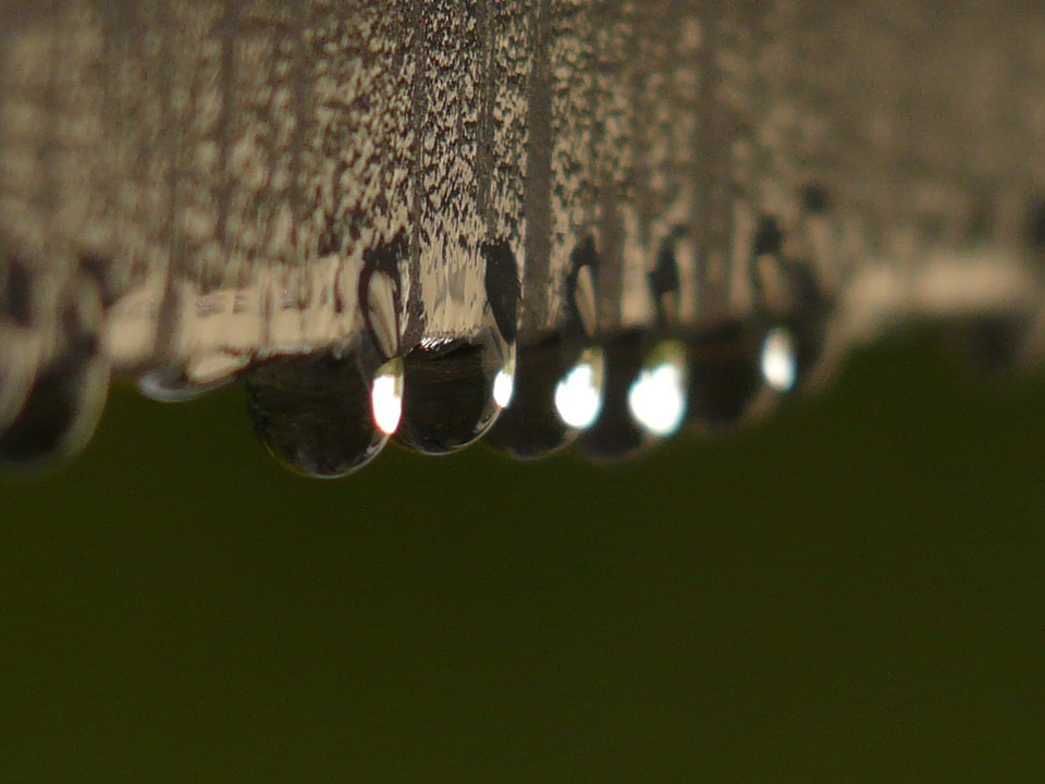Wet surface tension rain