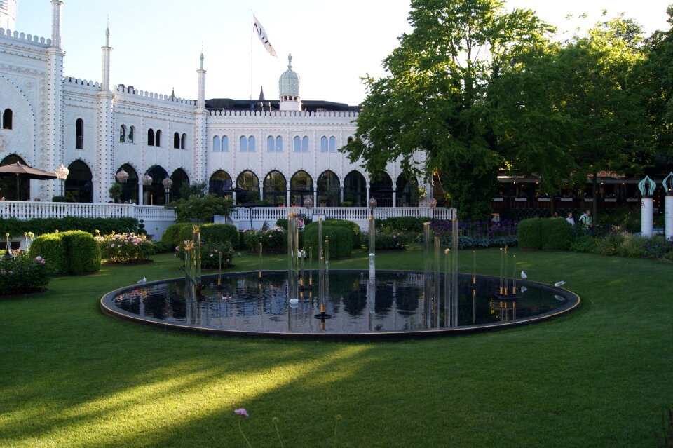 Fountain white building trees