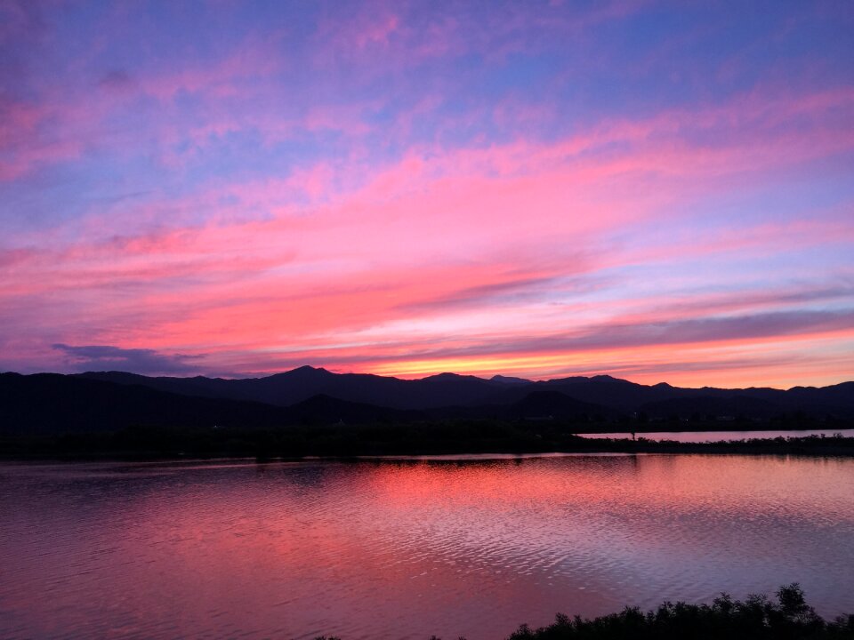 Pink sunset lake landscape architects
