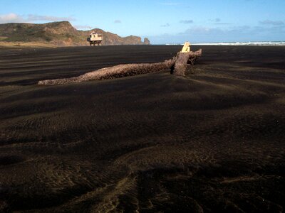 Coast sand black sand photo