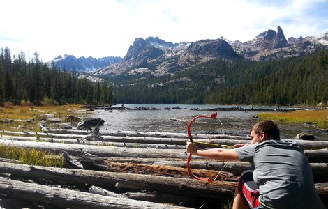 Archery goofing around boy