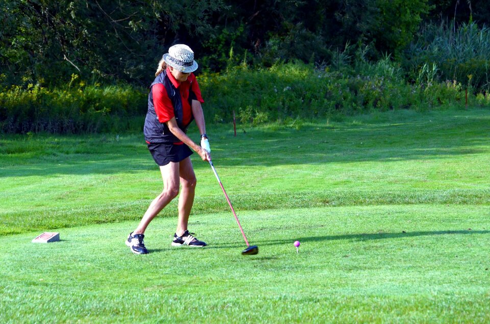Woman golf ball tee