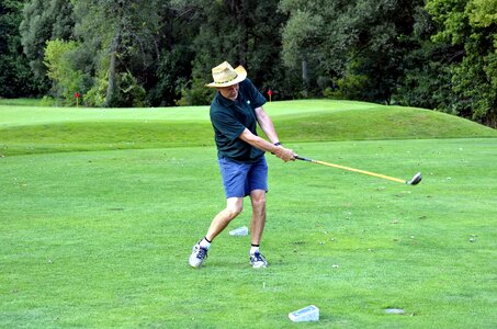 Man golf ball tee photo