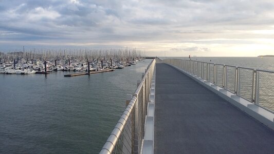 Ocean pier boats photo