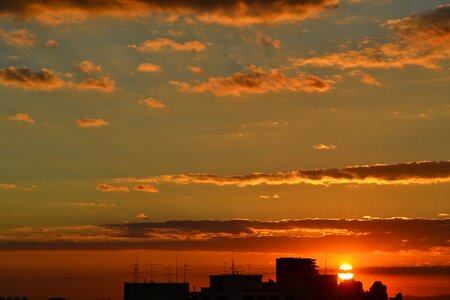 Sunset orange sky clouds photo