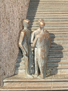 Group of people metal artwork