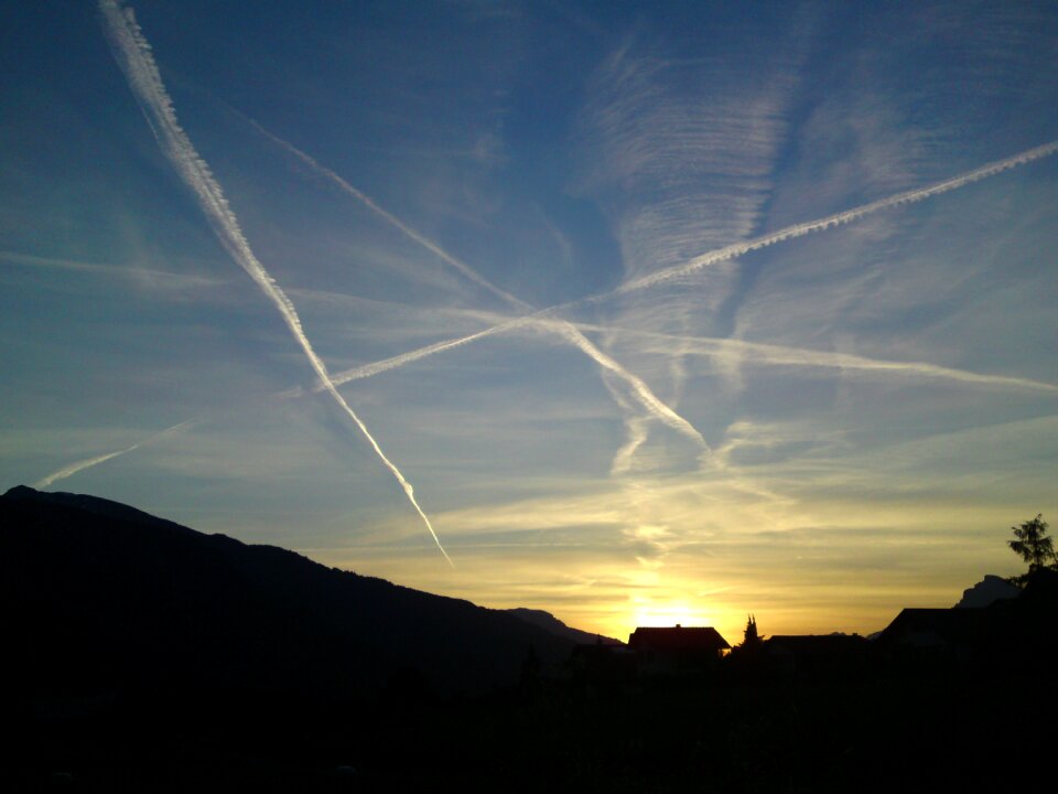 Clouds contrail dusk photo