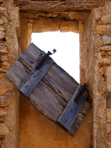 Metaphor broken stone house photo