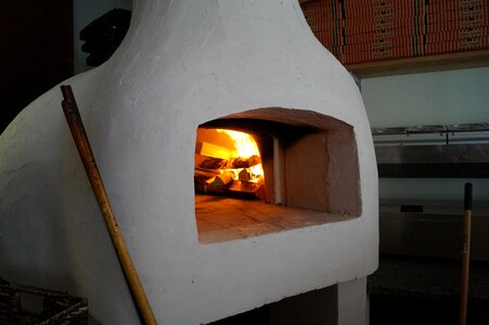 Wood burning stove pizzeria wood fired pizzas photo