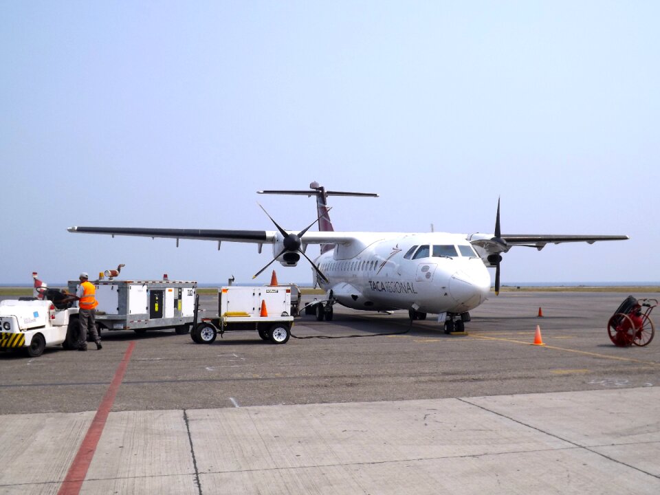 Plane loading luggage
