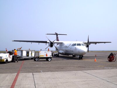 Plane loading luggage