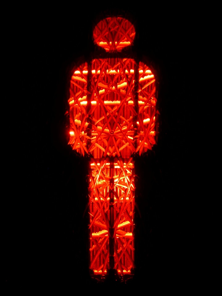 Red little green man traffic signal