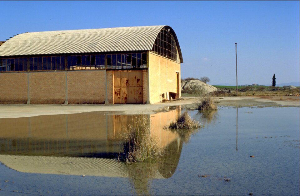 Factory hall mirroring water
