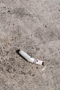 Cigarette butts concrete floor litter anywhere
