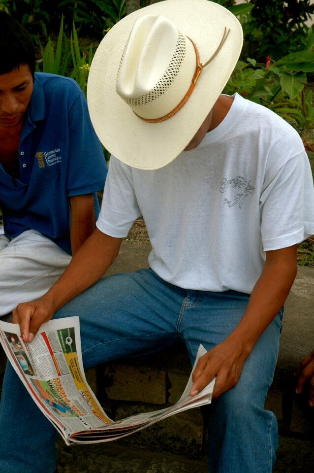 Central america man newspaper