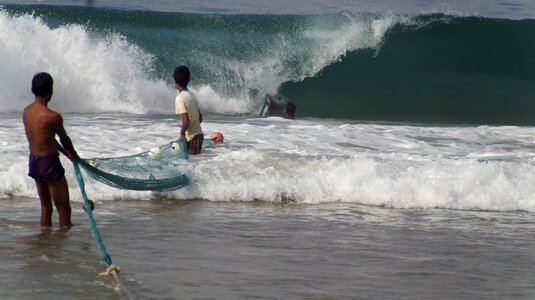 Fishing sea wave photo