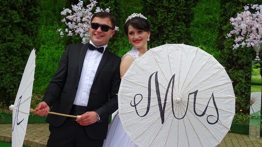 Bride and groom wedding umbrella