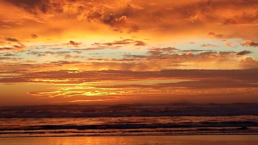 Beach sunset ocean sea photo