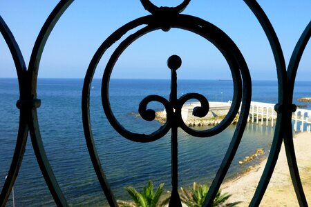 Wrought iron balcony blue balcony photo