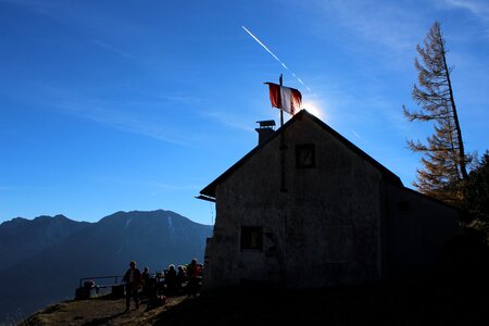 Sun contrail contrasts photo