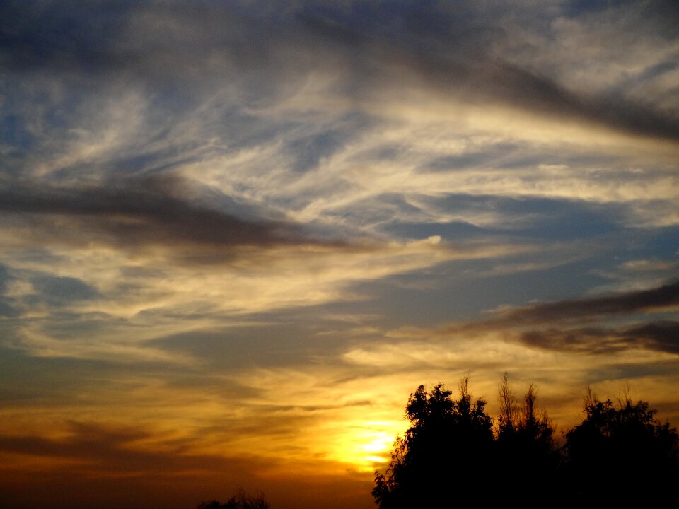 Landscape clouds ray of light photo