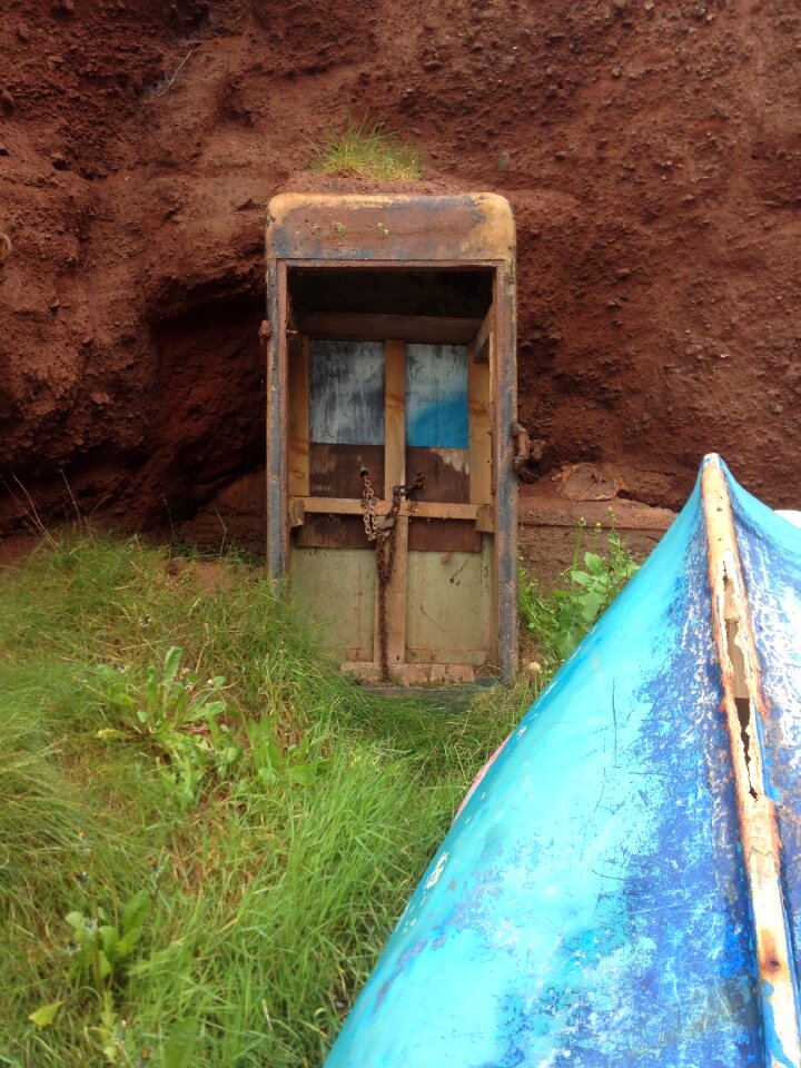Phone booth worn derelict