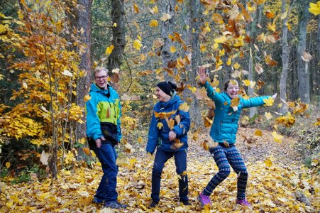Children fallen golden autumn