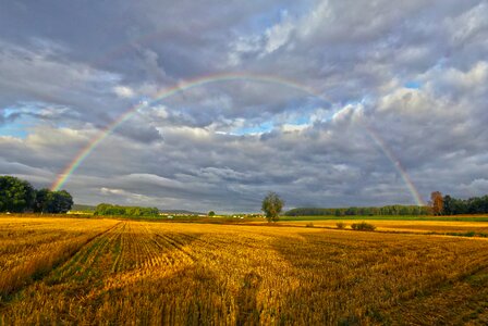 Rainbow landscape clouds photo