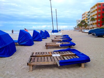 Sand ocean beach chairs photo