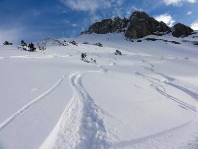 Wintry mountains ski tracks photo