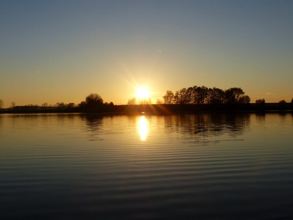 Sunset the sky water photo