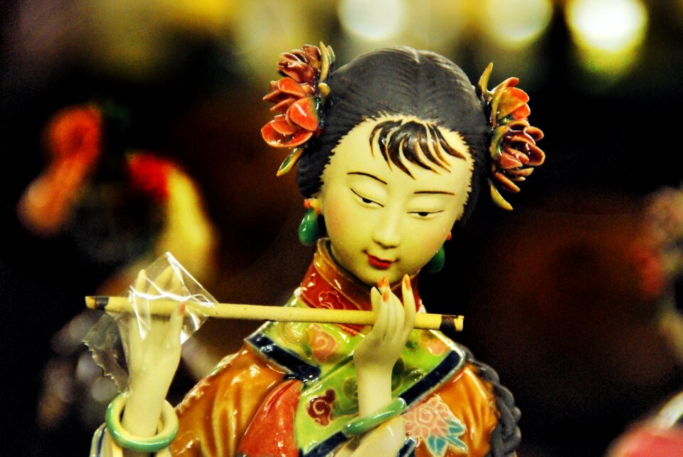 Flutist traditional trinket