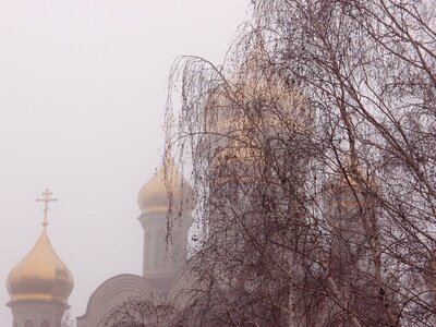 Fog weather golden domes photo