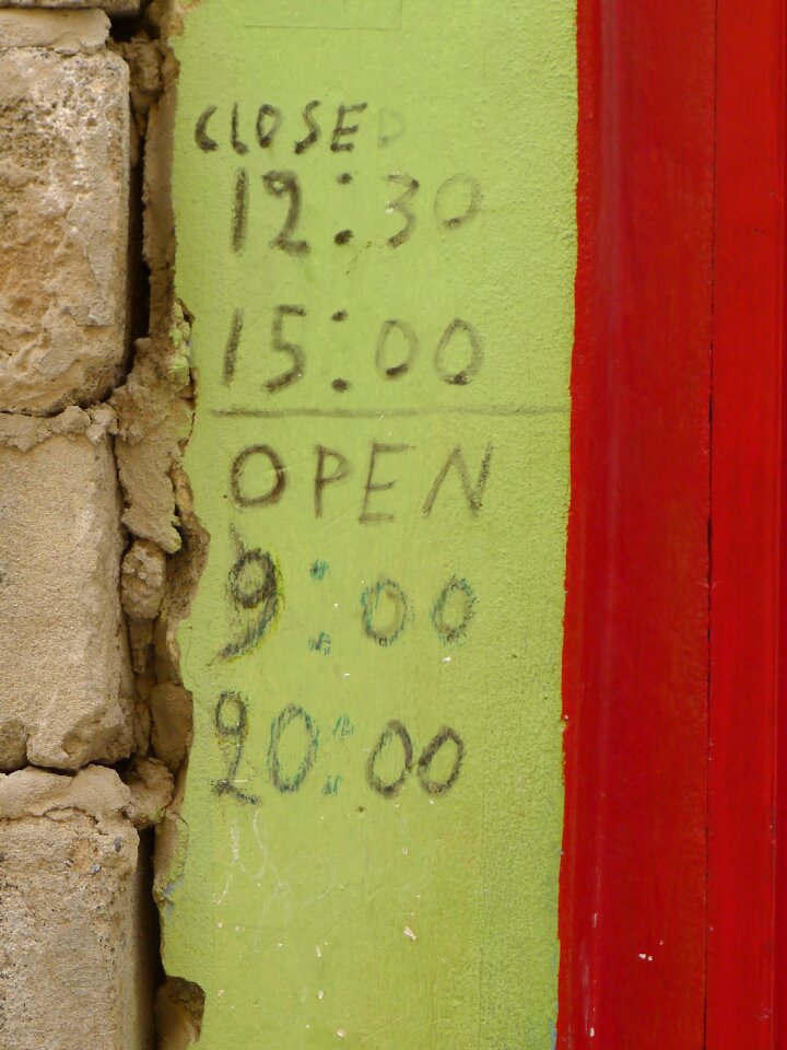 Shop sign opening hours