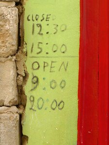 Shop sign opening hours