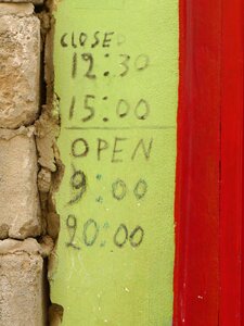 Shop sign opening hours photo