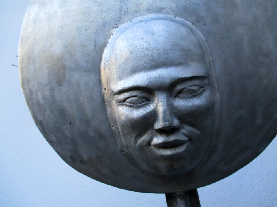 Face metal sculpture