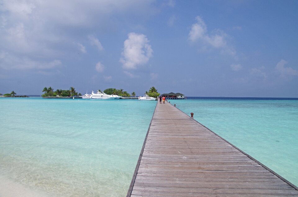 Water taxi pier blue water photo