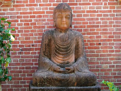 Carved stone antique buddha photo